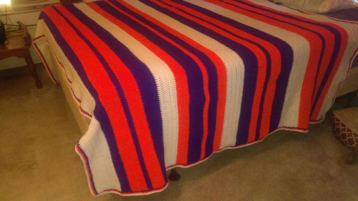 A Bed With A Red White And Blue Blanket On It - Clemson Crochet Blanket Pattern